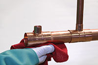 removing excess flus from copper tube